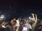 Female students protest after hidden camera was found in girls' hostel washroom in Andhra Pradesh. (screengrab)