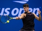 Carlos Alcaraz, of Spain returns a shot to Botic van De Zandschulp, of the Netherlands, during the second round of the U.S. Open Carlos Alcaraz, of Spain returns a shot to Botic van De Zandschulp, of the Netherlands, during the second round of the U.S. Open