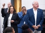 Democratic presidential candidate US Vice President Kamala Harris and her running mate, Governor Tim Walz,enjoy music by members of the marching band at Liberty County High School in Hinesville, Georgia, August 28, 2024, as they travel across Georgia for a 2-day campaign bus tour. (Photo by SAUL LOEB / AFP) Democratic presidential candidate US Vice President Kamala Harris and her running mate, Governor Tim Walz,enjoy music by members of the marching band at Liberty County High School in Hinesville, Georgia, August 28, 2024, as they travel across Georgia for a 2-day campaign bus tour. (Photo by SAUL LOEB / AFP)