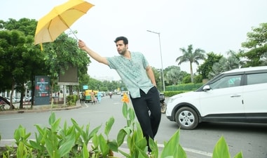 Actor Ankur Rathee makes a move towards monsoon in Delhi while on his way to his ancestral village in Haryana. (Photo: Manoj Verma/HT)