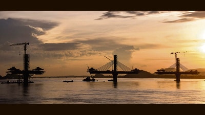A bridge is built across the Brahmaputra, in Guwahati. (PTI) A bridge is built across the Brahmaputra, in Guwahati. (PTI)