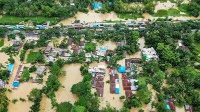 An aerial view shows partially submerged houses after flood in Feni, Bangladesh on August 24 (AFP) An aerial view shows partially submerged houses after flood in Feni, Bangladesh on August 24 (AFP)