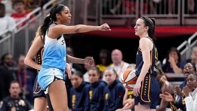INDIANAPOLIS, INDIANA - JUNE 16: Angel Reese #5 of the Chicago Sky reacts after fouling Caitlin Clark #22 of the Indiana Fever during the second half at Gainbridge Fieldhouse on June 16, 2024 in Indianapolis, Indiana. (Getty Images via AFP)