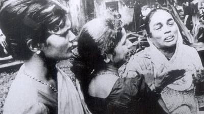 Desecration of Ambedkar Statue - Ramabai Chawl Riots - JULY 11, 1997 - Mumbai - Grieving women wails at Rajawadi Municipal Hospital following the death of their Kith and Kin in Police firing after Violence broke out due to desecration of an ambedkar statue at Ramabai Nagar in North - East Mumbai on Friday. Eleven People were reportedly killed when Police opened fire ona violent mob. PTI PHOTO - RIOTS MAHARASHTRA Desecration of Ambedkar Statue - Ramabai Chawl Riots - JULY 11, 1997 - Mumbai - Grieving women wails at Rajawadi Municipal Hospital following the death of their Kith and Kin in Police firing after Violence broke out due to desecration of an ambedkar statue at Ramabai Nagar in North - East Mumbai on Friday. Eleven People were reportedly killed when Police opened fire ona violent mob. PTI PHOTO - RIOTS MAHARASHTRA
