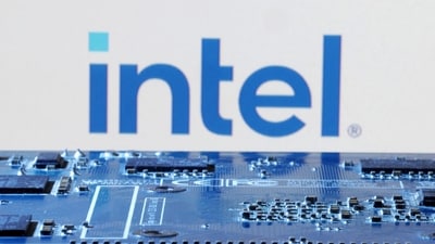 Intel logo is seen near computer motherboard. (Reuters)