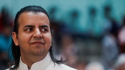 Bhavish Aggarwal, CEO of Ola Cabs and founder of Ola Electric attends Ola Electric's listing ceremony at the National Stock Exchange (NSE) in Mumbai. (Reuters)