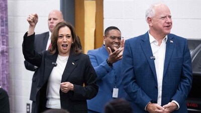 Democratic presidential candidate US Vice President Kamala Harris and her running mate, Governor Tim Walz,enjoy music by members of the marching band at Liberty County High School in Hinesville, Georgia, August 28, 2024, as they travel across Georgia for a 2-day campaign bus tour. (Photo by SAUL LOEB / AFP) (AFP) Democratic presidential candidate US Vice President Kamala Harris and her running mate, Governor Tim Walz,enjoy music by members of the marching band at Liberty County High School in Hinesville, Georgia, August 28, 2024, as they travel across Georgia for a 2-day campaign bus tour. (Photo by SAUL LOEB / AFP) (AFP)