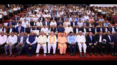 Yogi Adityanath, state finance minister Suresh Khanna, cabinet minister Nand Gopal Gupta with industrialists during a programme at Lok Bhavan in Lucknow on Friday. (HT PHOTO) Yogi Adityanath, state finance minister Suresh Khanna, cabinet minister Nand Gopal Gupta with industrialists during a programme at Lok Bhavan in Lucknow on Friday. (HT PHOTO)