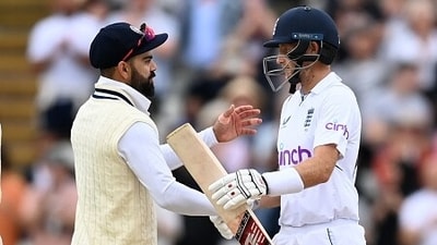 Virat Kohli (L) and Joe Root. (Getty) Virat Kohli (L) and Joe Root. (Getty)
