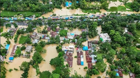 An aerial view shows partially submerged houses after flood in Feni, Bangladesh on August 24 (AFP)