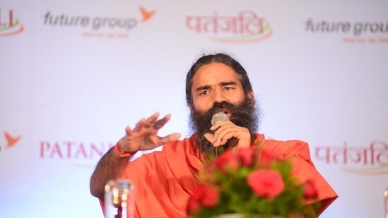 Baba Ram Dev of Patanjali Ayurveda speaking at a conference. (HT File Photo)