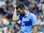 Novak Djokovic of Serbia looks dejected during his match against Alexie Popyrin of Australia on day five of the 2024 U.S. Open tennis tournament at the USTA Billie Jean King National Tennis Center