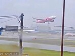 A plane takes off after a failed attempt to land, due to safety concerns following Typhoon Shanshan, in Hakata Ward, Fukuoka, Japan. 