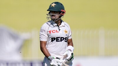 Pakistan's Babar Azam reacts as he walks off the field after his dismissal during the second day of second test cricket match between Pakistan and Bangladesh (AP) Pakistan's Babar Azam reacts as he walks off the field after his dismissal during the second day of second test cricket match between Pakistan and Bangladesh (AP)