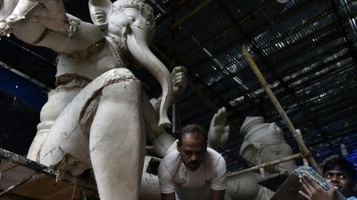 Mumbai, India - July 18, 2017: Artist makes the Lord Ganesha Idol from Clay and Plaster of Paris at Lower Parel and Chichpokhli in Mumbai, India, on Tuesday, July 18, 2017. (Photo by Anshuman Poyrekar/Hindustan Times) (Anshuman Poyrekar/HT Photo) Mumbai, India - July 18, 2017: Artist makes the Lord Ganesha Idol from Clay and Plaster of Paris at Lower Parel and Chichpokhli in Mumbai, India, on Tuesday, July 18, 2017. (Photo by Anshuman Poyrekar/Hindustan Times) (Anshuman Poyrekar/HT Photo)