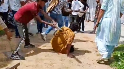 Screengrab showing people beating up a man over suspicion of eating beef, in Charkhi Dadri district in Haryana. (PTI) Screengrab showing people beating up a man over suspicion of eating beef, in Charkhi Dadri district in Haryana. (PTI)