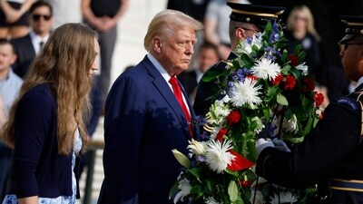 Republican presidential nominee, former U.S. President Donald Trump stands alongside Misty Fuoco, whose sister Sgt. Nicole Gee died in Abbey Gate Bombing, at a wreath laying ceremony at the Tomb of the Unknown Soldier at Arlington National Cemetery on August 26, 2024 in Arlington, (Photo by Anna Moneymaker / GETTY IMAGES NORTH AMERICA / Getty Images via AFP) (Getty Images via AFP) Republican presidential nominee, former U.S. President Donald Trump stands alongside Misty Fuoco, whose sister Sgt. Nicole Gee died in Abbey Gate Bombing, at a wreath laying ceremony at the Tomb of the Unknown Soldier at Arlington National Cemetery on August 26, 2024 in Arlington, (Photo by Anna Moneymaker / GETTY IMAGES NORTH AMERICA / Getty Images via AFP) (Getty Images via AFP)
