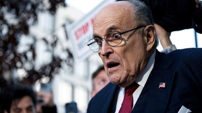 FILE PHOTO: Former New York Mayor Rudy Giuliani departs the U.S. District Courthouse after he was ordered to pay $148 million in his defamation case in Washington, U.S., December 15, 2023.  REUTERS/Bonnie Cash/File Photo (REUTERS)