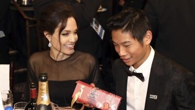 Angelina Jolie and Brad Pitt's son, Pax, is "doing ok" a month after his accident. (AP) Angelina Jolie and Brad Pitt's son, Pax, is "doing ok" a month after his accident. (AP)