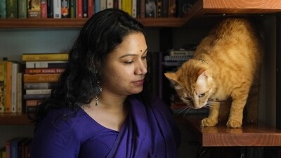 Author and journalist Neha Dixit has a quiet word with Mirchi the cat