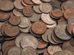Solve this coin puzzle and see if you can figure out the number of coins in the bag. 