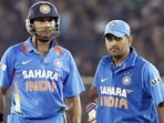 Yuvraj Singh and MS Dhoni in action for India in an ODI against England in 2013.