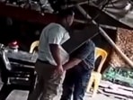 Screengrab - A video went viral on social media, showing policemen in Mumbai allegedly planting drugs on a man during a raid Screengrab - A video went viral on social media, showing policemen in Mumbai allegedly planting drugs on a man during a raid