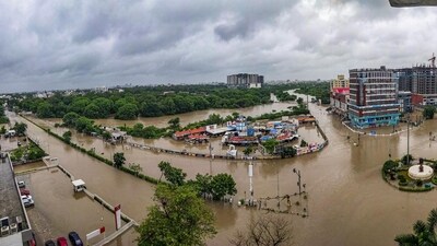 A flooded area after heavy rainfall in Vadodara on Tuesday. (PTI) A flooded area after heavy rainfall in Vadodara on Tuesday. (PTI)