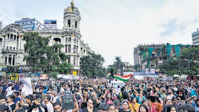 People protest the rape and murder of a doctor in Kolkata, on Sunday. (PTI)