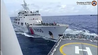 This frame grab shows a Chinese coast Guard ship colliding with Philippine Coast Guard ship BRP Teresa Magbanua near the Sabina Shoal in disputed waters of the South China Sea. (Photo by Handout / Philippine Coast Guard (PCG) / AFP) (AFP) This frame grab shows a Chinese coast Guard ship colliding with Philippine Coast Guard ship BRP Teresa Magbanua near the Sabina Shoal in disputed waters of the South China Sea. (Photo by Handout / Philippine Coast Guard (PCG) / AFP) (AFP)
