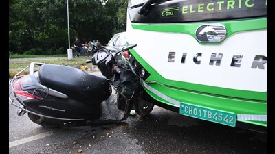 The mangled remains of the scooter after the collision on the Sector 2/10 dividing road in Chandigarh on Sunday afternoon. (Sanjeev Sharma/HT) The mangled remains of the scooter after the collision on the Sector 2/10 dividing road in Chandigarh on Sunday afternoon. (Sanjeev Sharma/HT)