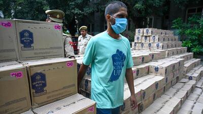 The seized consignment included 166 boxes with 1,992 bottles, 223 boxes with 5,352 half-pints, and 181 boxes with 8,688 quarter bottles, police revealed. (Sunil Ghosh/HT Photo)