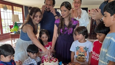 All the kids are eagerly looking at the strawberry cake on the occasion of Saba's birthday. 