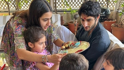 Sara Ali Khan showing Inaaya how to greet her brothers Taimur and Jeh on the day of Rakhi. 