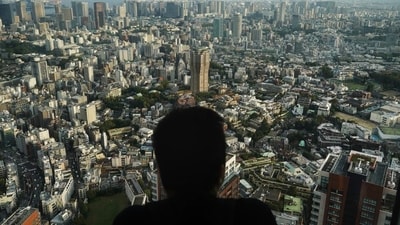 A man watches the cityscape of Tokyo from an observation deck located on the top floor of Roppongi Hills Mori Tower. Tokyo is a gigantic concrete jungle built on layers of tradition and culture. It’s difficult to grasp the enormity of Japan’s capital in just a few days and the one way to gain some perspective on the complex city is to get above it — way above it. (Jae C. Hong/AP)