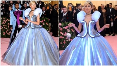 At the 2019 Met Gala, Zendaya transformed into Cinderella, wearing a stunning light-up dress by Tommy Hilfiger. Her stylist, Law Roach, played the role of her fairy godmother, using a wand to illuminate the gown. Fittingly, her bag was designed to resemble Cinderella's iconic carriage. (Pinterest) At the 2019 Met Gala, Zendaya transformed into Cinderella, wearing a stunning light-up dress by Tommy Hilfiger. Her stylist, Law Roach, played the role of her fairy godmother, using a wand to illuminate the gown. Fittingly, her bag was designed to resemble Cinderella's iconic carriage. (Pinterest)
