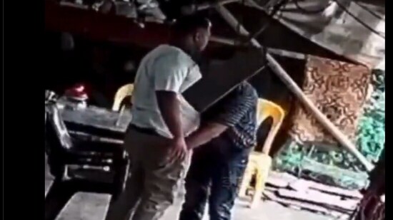 Screengrab - A video went viral on social media, showing policemen in Mumbai allegedly planting drugs on a man during a raid