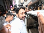 Amanatullah Khan being taken away by ED officials. 