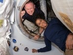 (FILES) This undated handout picture from Nasa released on July 2, 2024 shows NASA�s Boeing Crew Flight Test astronauts (from top) Butch Wilmore and Suni Williams inside the vestibule. (FILES) This undated handout picture from Nasa released on July 2, 2024 shows NASA�s Boeing Crew Flight Test astronauts (from top) Butch Wilmore and Suni Williams inside the vestibule.