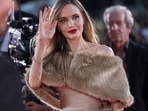 Angelina Jolie poses on the red carpet during arrivals for the screening of the movie Maria, in competition, at the 81st Venice Film Festival, Venice. (REUTERS)