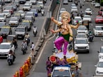 An idol of Lord Ganesha being transported ahead of Ganesh Chaturthi festival, in Mumbai. The fee for out-of-series numbers has risen to  <span class='webrupee'>₹</span>18 lakh. The first revision since 2013 also allows transferring VIP numbers to immediate family members.