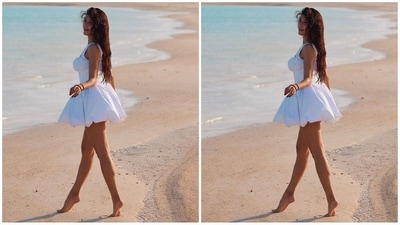 In another stylish white ensemble, Jacqueline Fernandez dazzled in a mini dress featuring a trendy bubble hemline and ruffled detailing around the neck, adding a chic touch to the look. (Instagram/@jacquelienefernandez) In another stylish white ensemble, Jacqueline Fernandez dazzled in a mini dress featuring a trendy bubble hemline and ruffled detailing around the neck, adding a chic touch to the look. (Instagram/@jacquelienefernandez)
