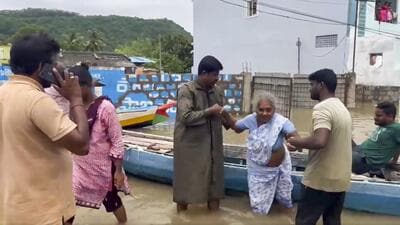 Evacuation and relief work underway in the flood-hit Tadepalli Mahanadu, Andhrapradesh. (PTI) Evacuation and relief work underway in the flood-hit Tadepalli Mahanadu, Andhrapradesh. (PTI)