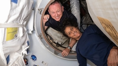 (FILES) This undated handout picture from Nasa released on July 2, 2024 shows NASA�s Boeing Crew Flight Test astronauts (from top) Butch Wilmore and Suni Williams inside the vestibule. (AFP) (FILES) This undated handout picture from Nasa released on July 2, 2024 shows NASA�s Boeing Crew Flight Test astronauts (from top) Butch Wilmore and Suni Williams inside the vestibule. (AFP)