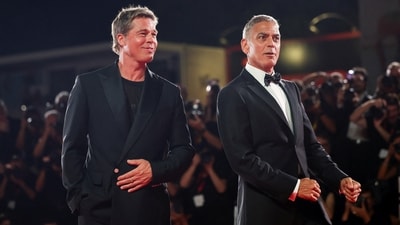 George Clooney jokes about one thing he loves about working with Brad Pitt. REUTERS/Louisa Gouliamaki (REUTERS)