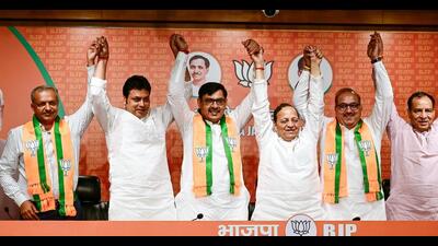 Former JJP leaders Devender Singh Babli, Sunil Sangwan and Sanjay Kablana join the Bharatiya Janata Party (BJP) in the presence of BJP National General Secretary Arun Singh, Former Tripura Chief Minister Biplab Deb and Haryana BJP President Mohan Lal Badoli, at party headquarters in New Delhi on Monday. (ANI Photo/Mohd Zakir) (ANI)