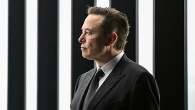 FILE PHOTO: Elon Musk attends the opening ceremony of the new Tesla Gigafactory for electric cars in Gruenheide, Germany, March 22, 2022. Patrick Pleul/Pool via REUTERS/File Photo (via REUTERS)