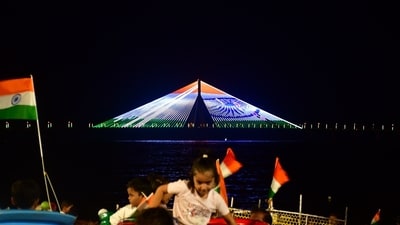 Mumbai, India – Aug 15, 2024: Bandra Worli Sea link  lit up with tricolour, in the occasion of Independence Day celebration, in Mumbai, India, on Thursday, Aug 15, 2024. (Photo by Bhushan Koyande/HT Photo)
