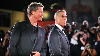 Actor George Clooney and actor Brad Pitt attend the red carpet of the movie "Wolfs" presented out of competition during the 81st International Venice Film Festival at Venice Lido, on September 1, 2024. (Photo by Alberto PIZZOLI / AFP) (AFP) Actor George Clooney and actor Brad Pitt attend the red carpet of the movie "Wolfs" presented out of competition during the 81st International Venice Film Festival at Venice Lido, on September 1, 2024. (Photo by Alberto PIZZOLI / AFP) (AFP)