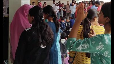 Research scholars stage a protest on Lucknow University campus on Monday